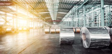 Rolls of steel sheet for automotive applications in a plant