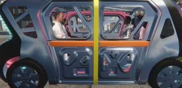 Passengers seated inside a Steel E-Motive vehicle